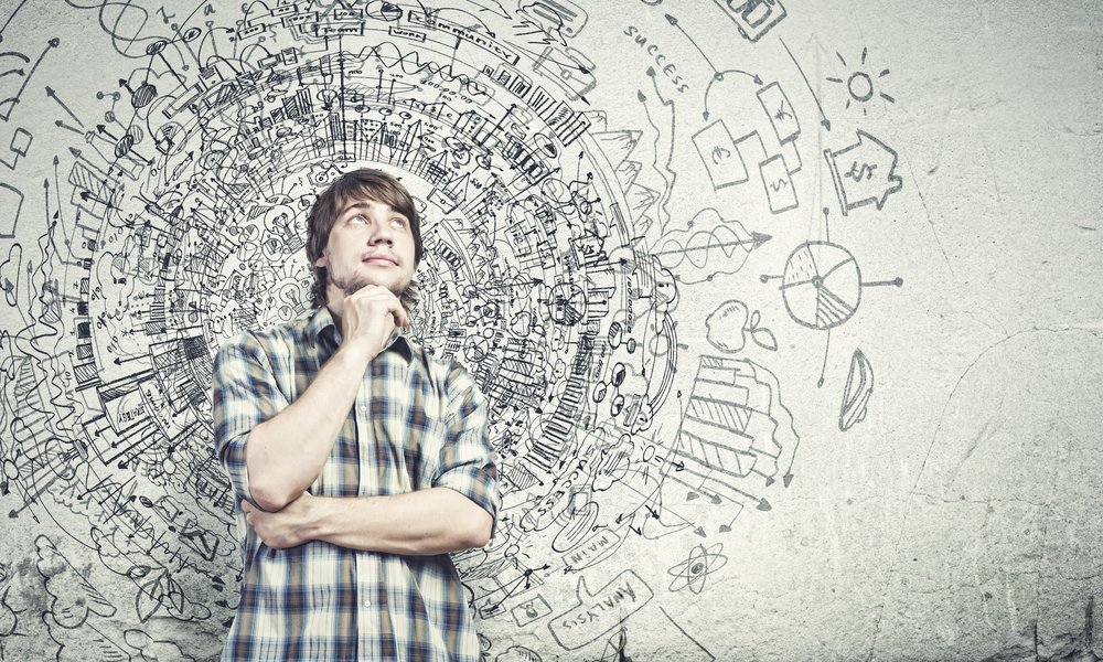 Young thoughtful handsome man in casual thinking over the ideas